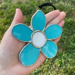 Blue and white stained glass flower